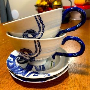 Anthropologie teacups with matching plates
